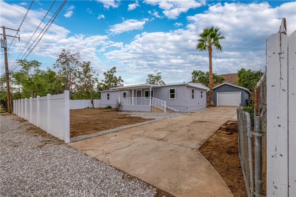 22597 Forrest Road Perris, CA 92570 - Photo 1 of 1 a view of a house with a backyard