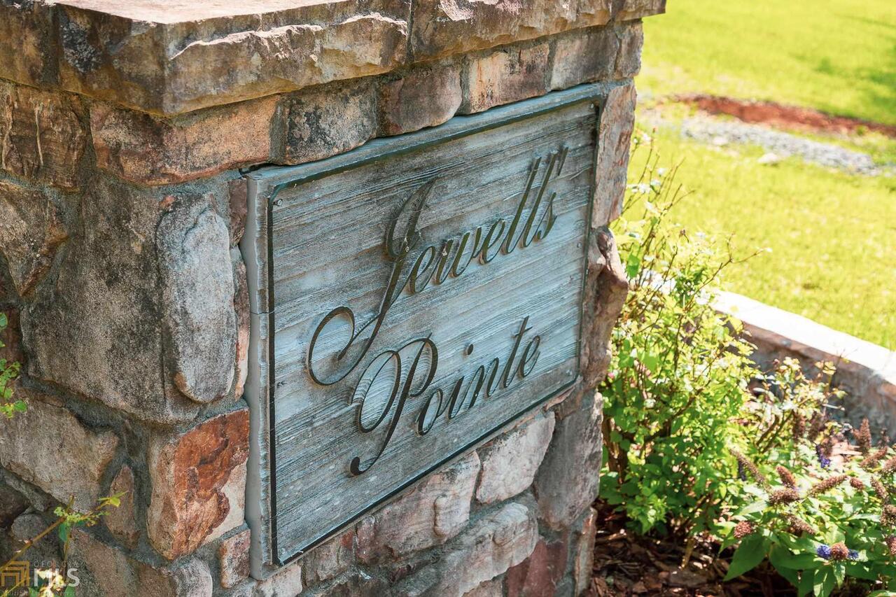 15 Jewell Drive Southeast, Unit 3 Rome, GA 30161 - Photo 2 of 26 a sign on the side of a building