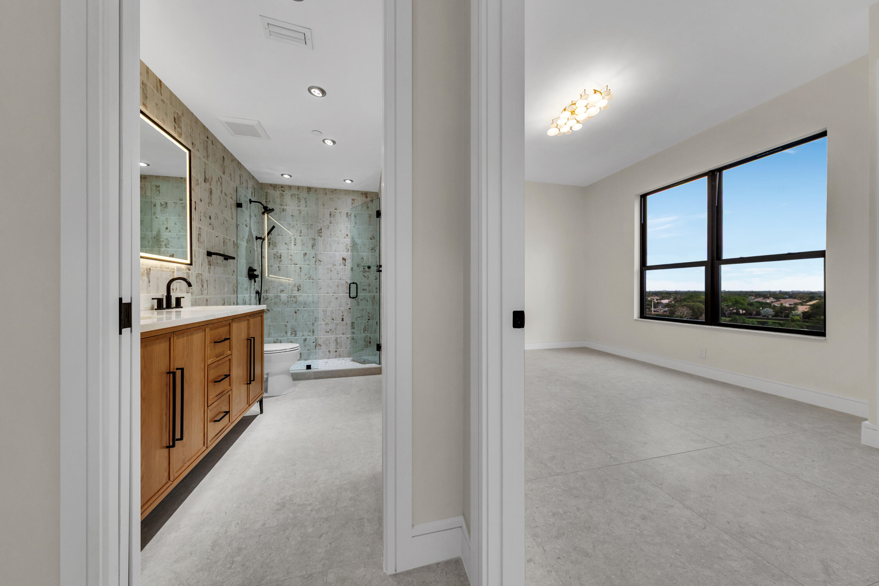 7351 Promenade Drive, Unit 801F Boca Raton, FL 33433 - Photo 32 of 47 Ensuite Full Guest bath