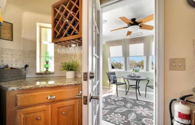 a spacious bathroom with a double vanity sink and a mirror