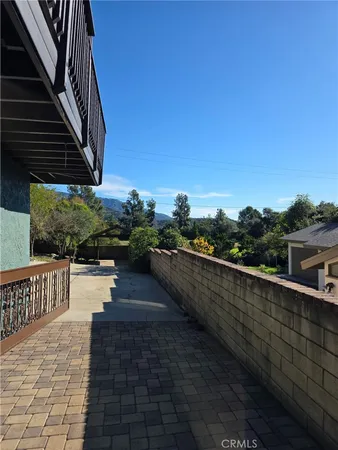 a view of a street with a park