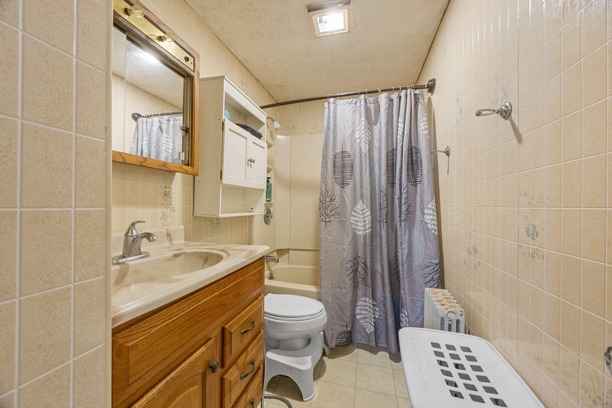 320-322 Old Bedford Road Westport, MA 02790 - Photo 13 of 33 a bathroom with a sink a toilet and shower