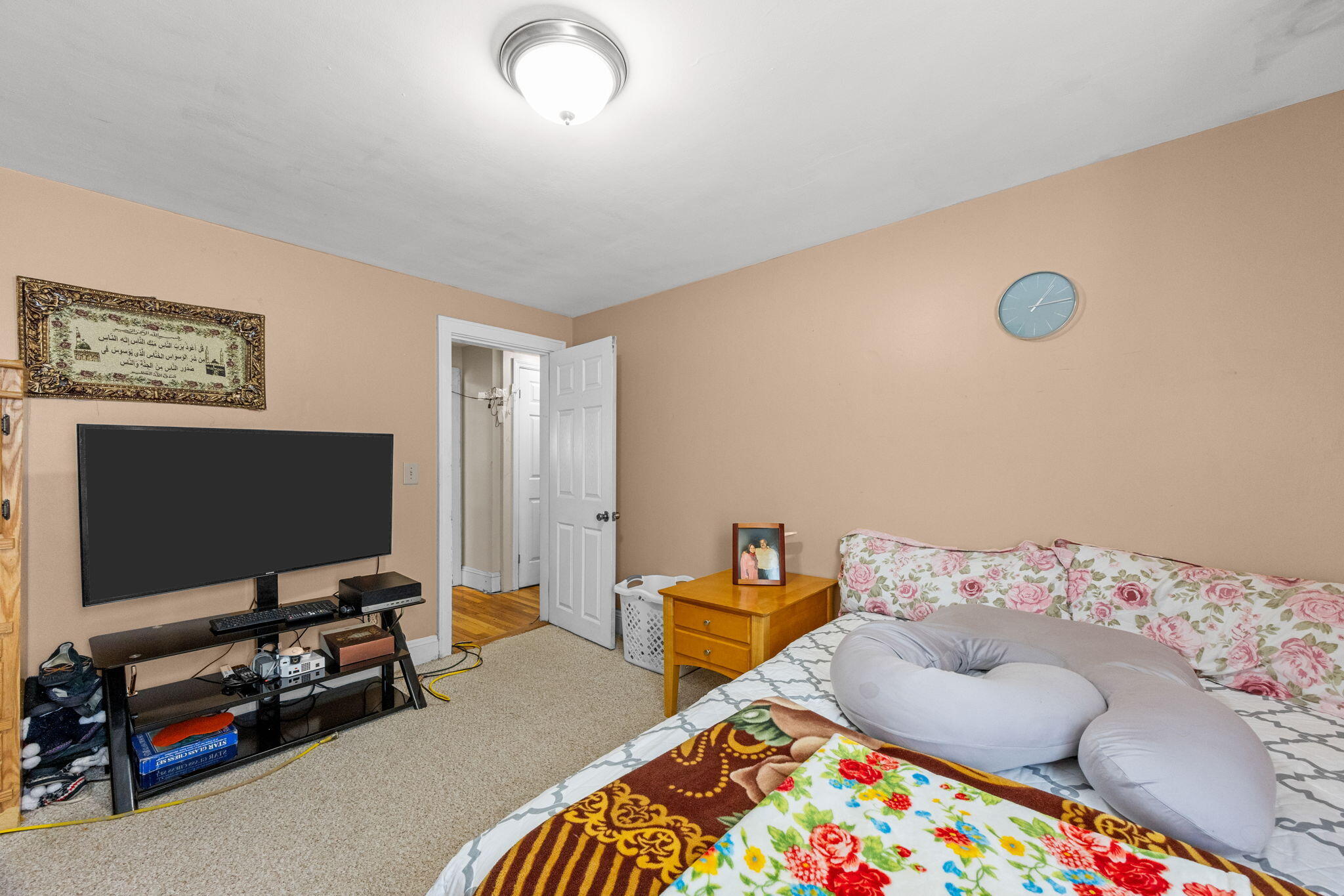 320-322 Old Bedford Road Westport, MA 02790 - Photo 15 of 33 a bedroom with a bed and a flat screen tv