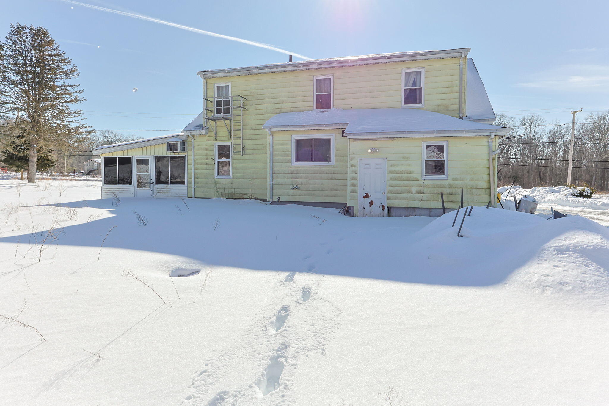 320-322 Old Bedford Road Westport, MA 02790 - Photo 27 of 33 a front view of a house with a yard