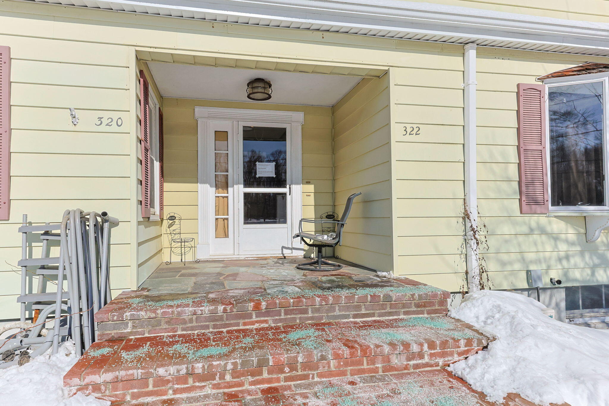 320-322 Old Bedford Road Westport, MA 02790 - Photo 3 of 33 a view of a entryway door front of house