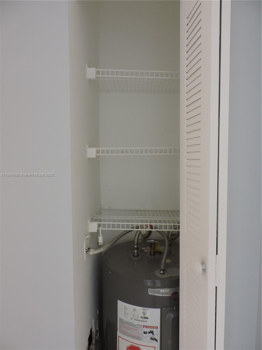 13045 Southwest 68th Street, Unit 104 Miami, FL 33183 - Photo 7 of 16 a close up of a mirror