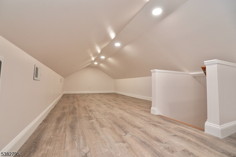 207 Franklin Avenue Belleville, NJ 07109 - Photo 7 of 9 a view of empty room with wooden floor