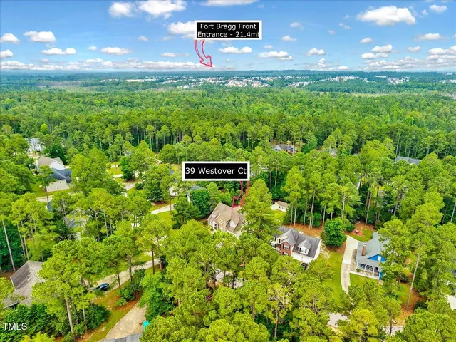 a view of a lake with a yard