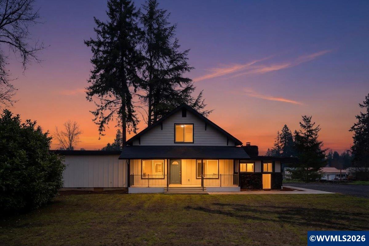 28411 Liberty Road Sweet Home, OR 97386 - Photo 1 of 50 a front view of a house with a yard