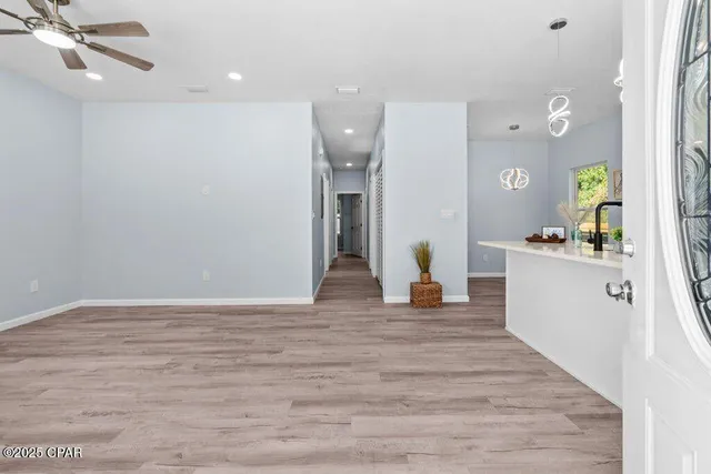 a view of an empty room and window