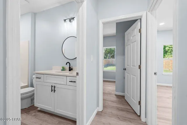 a view of a house with backyard and garden