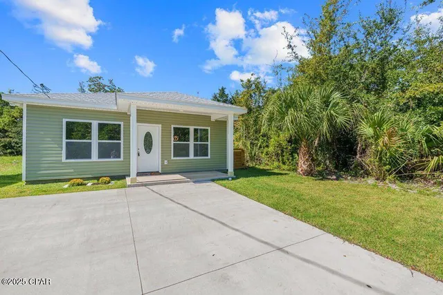 a view of an outdoor space and a yard
