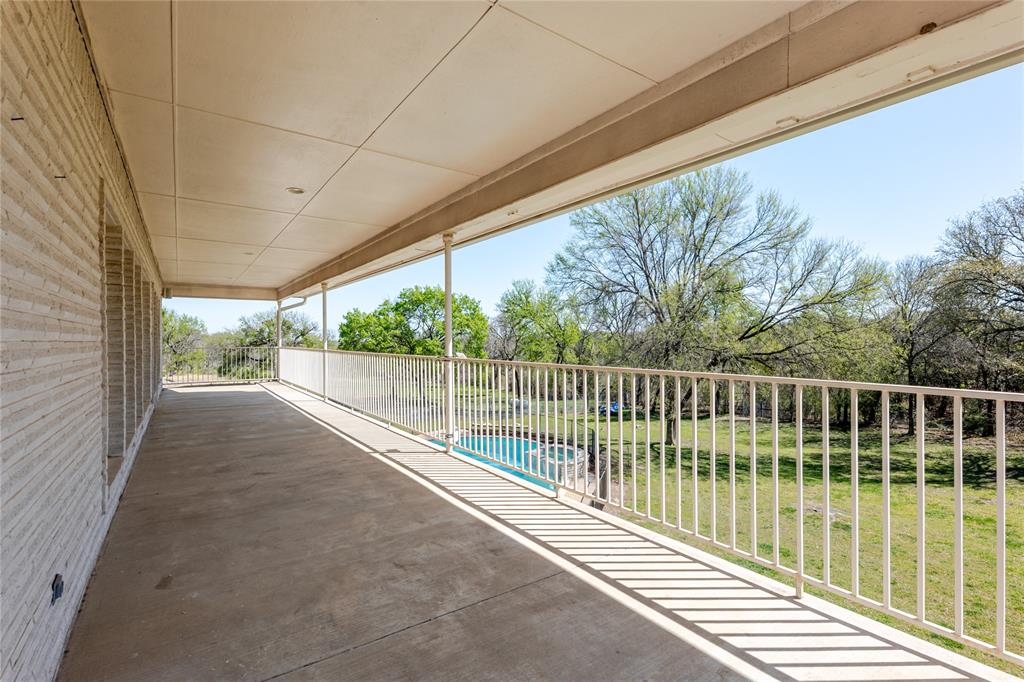 166 East Rio Ridge Azle, TX 76020 - Photo 33 of 40 a view of balcony with wooden floor