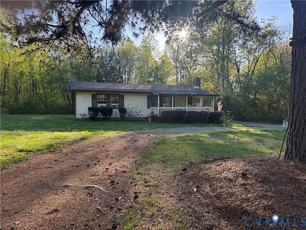 1313 Poplar Lawn Road Blackstone, VA 23824 - Photo 2 of 26 a view of a house with a yard
