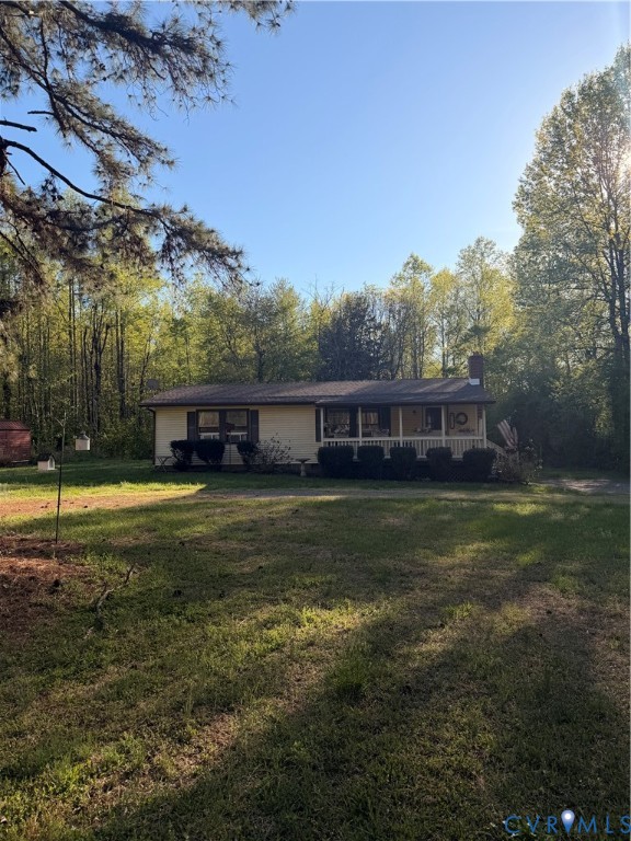 1313 Poplar Lawn Road Blackstone, VA 23824 - Photo 26 of 26 a front view of a house with a yard