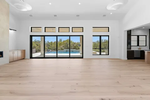a large kitchen with stainless steel appliances