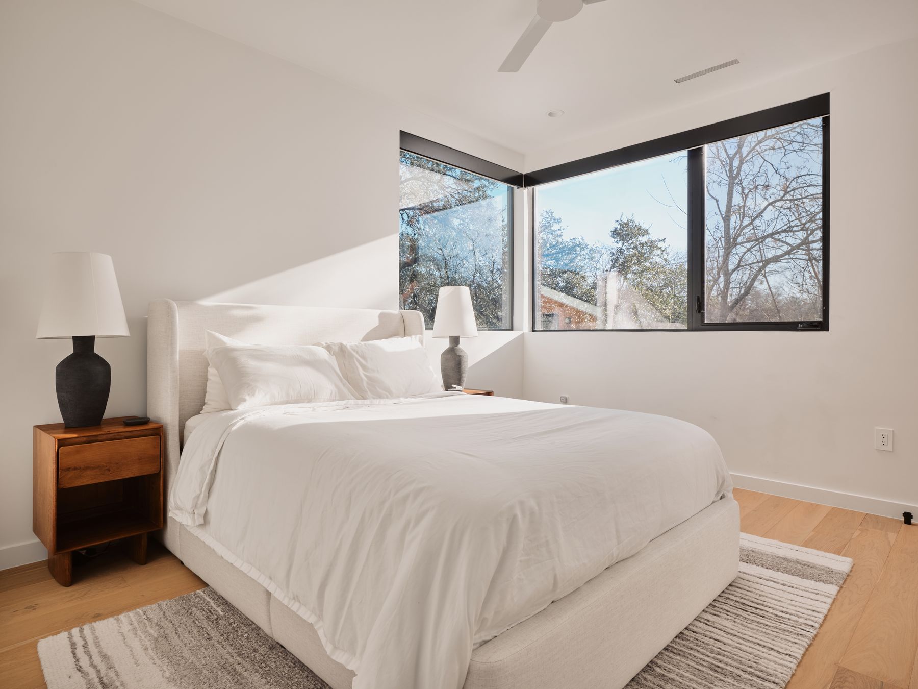 3209 Clawson Road Austin, TX 78704 - Photo 13 of 30 Bedroom featuring light wood-style floors and ceiling fan