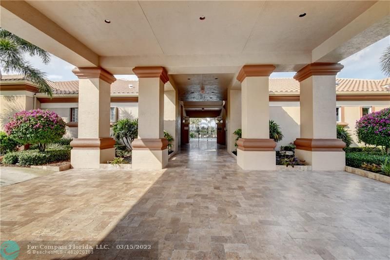 Boca Falls Boca Raton, FL 33428 - Photo 29 of 40 a view of a lobby with furniture and floor to ceiling window