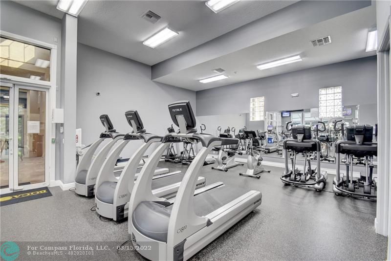 Boca Falls Boca Raton, FL 33428 - Photo 30 of 40 a view of a room with gym equipment