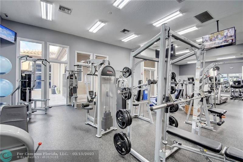Boca Falls Boca Raton, FL 33428 - Photo 31 of 40 a view of a room with gym equipment
