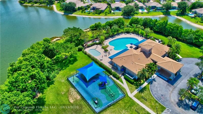 Boca Falls Boca Raton, FL 33428 - Photo 39 of 40 an aerial view of a house with a lake view