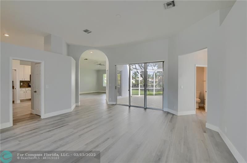 Boca Falls Boca Raton, FL 33428 - Photo 9 of 40 wooden floor in an empty room with a window