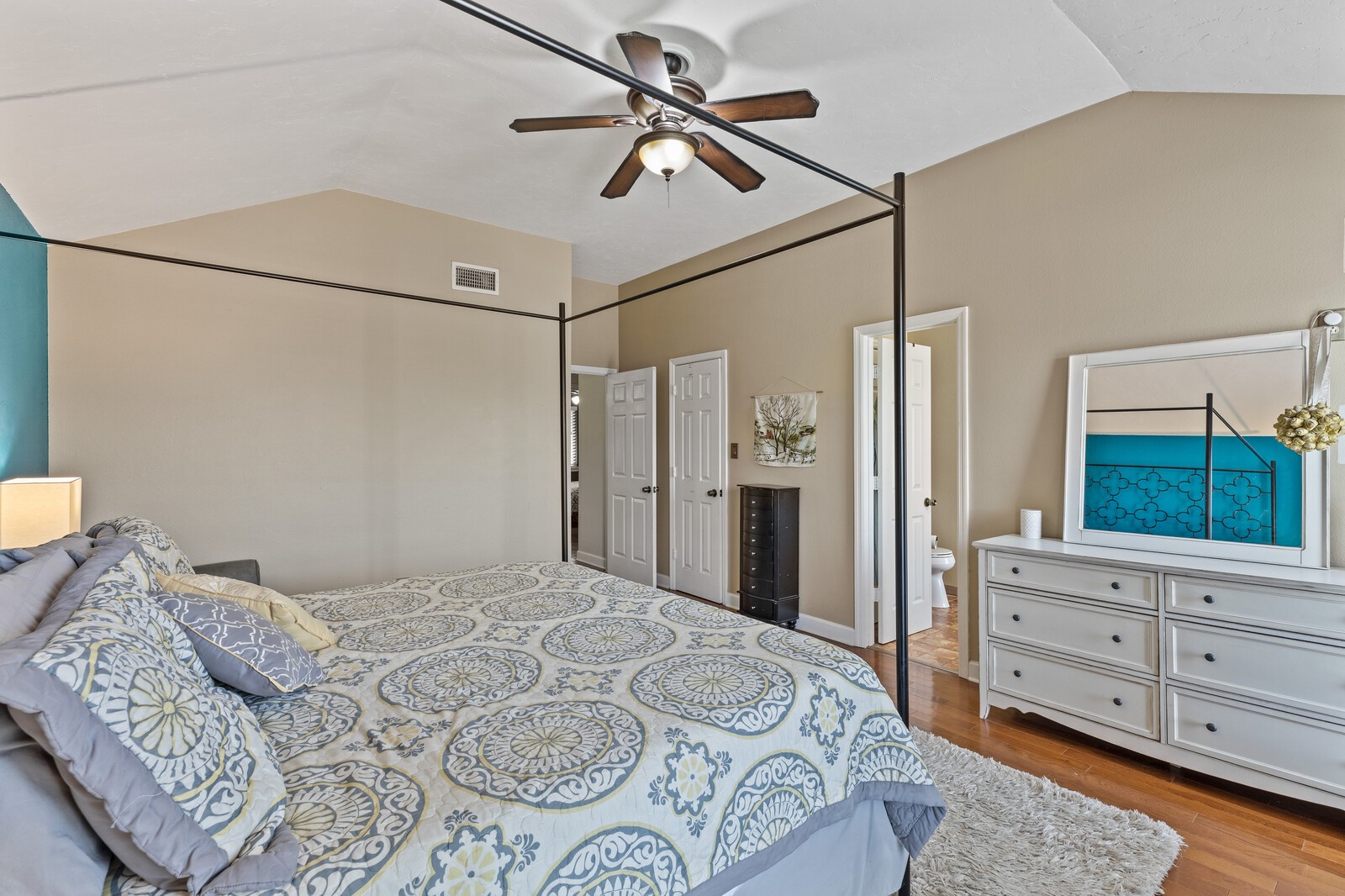 1225 Jacksons View Road Hermitage, TN 37076 - Photo 14 of 29 a bedroom with a large bed and a mirror on the dresser
