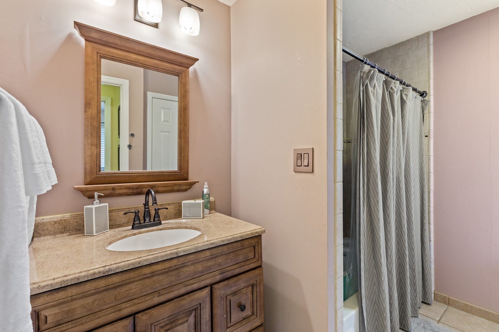 1225 Jacksons View Road Hermitage, TN 37076 - Photo 20 of 29 a bathroom with a granite countertop sink and a mirror