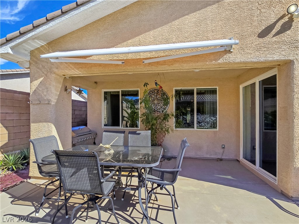 2485 Morrow Ridge Place Laughlin, NV 89029 - Photo 31 of 40 An inviting covered patio offers ample space for outdoor dining and entertainment.