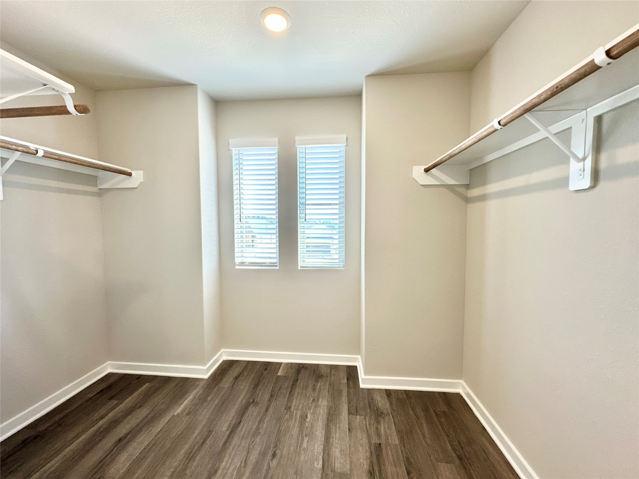 12187 Ridge Top Drive Conroe, TX 77304 - Photo 10 of 26 a view of empty room with wooden floor and fan