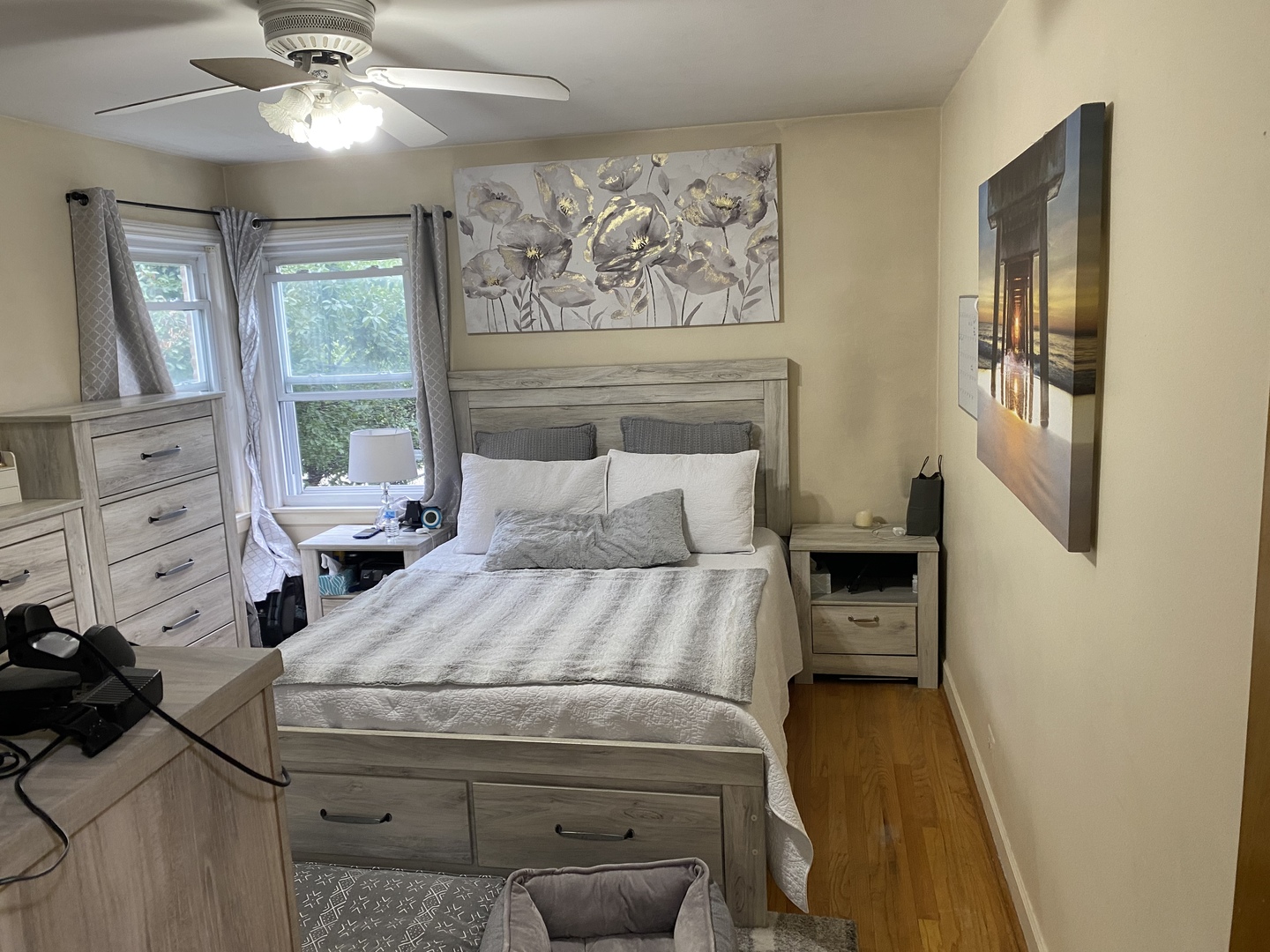 8206 Kilpatrick Avenue Skokie, IL 60076 - Photo 3 of 5 a bedroom with a bed and wooden floor