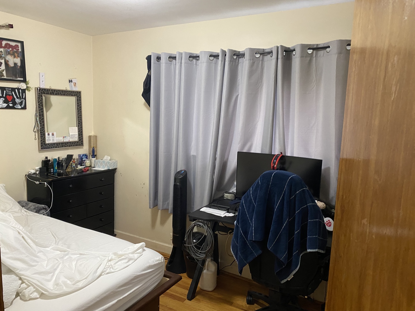 8206 Kilpatrick Avenue Skokie, IL 60076 - Photo 4 of 5 a bedroom with a bed and a dresser