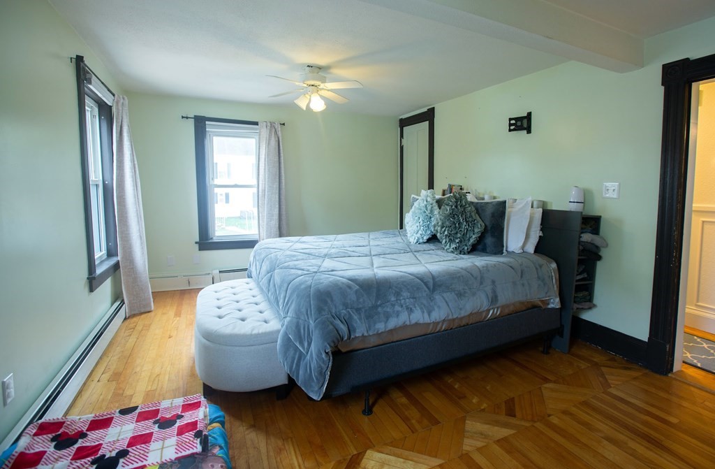 9 Clinton Street Ware, MA 01082 - Photo 14 of 25 a bedroom with bed and window