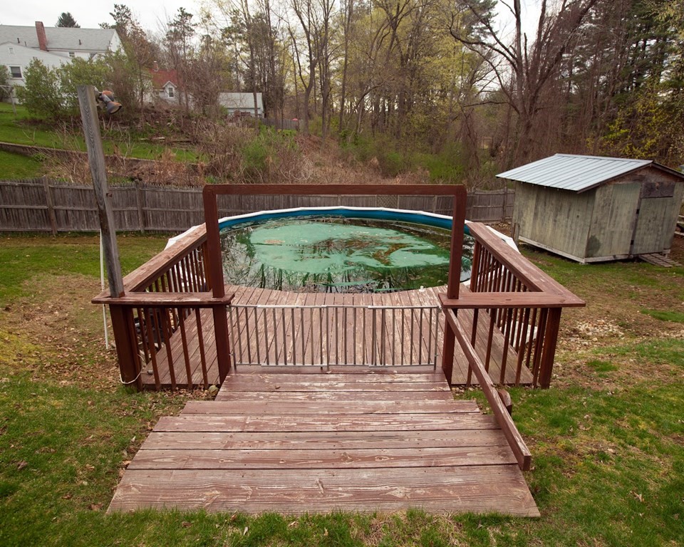 9 Clinton Street Ware, MA 01082 - Photo 25 of 25 a view of a wooden deck with a yard