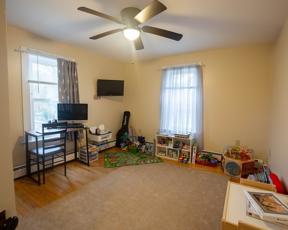 9 Clinton Street Ware, MA 01082 - Photo 10 of 25 a room with furniture and a window