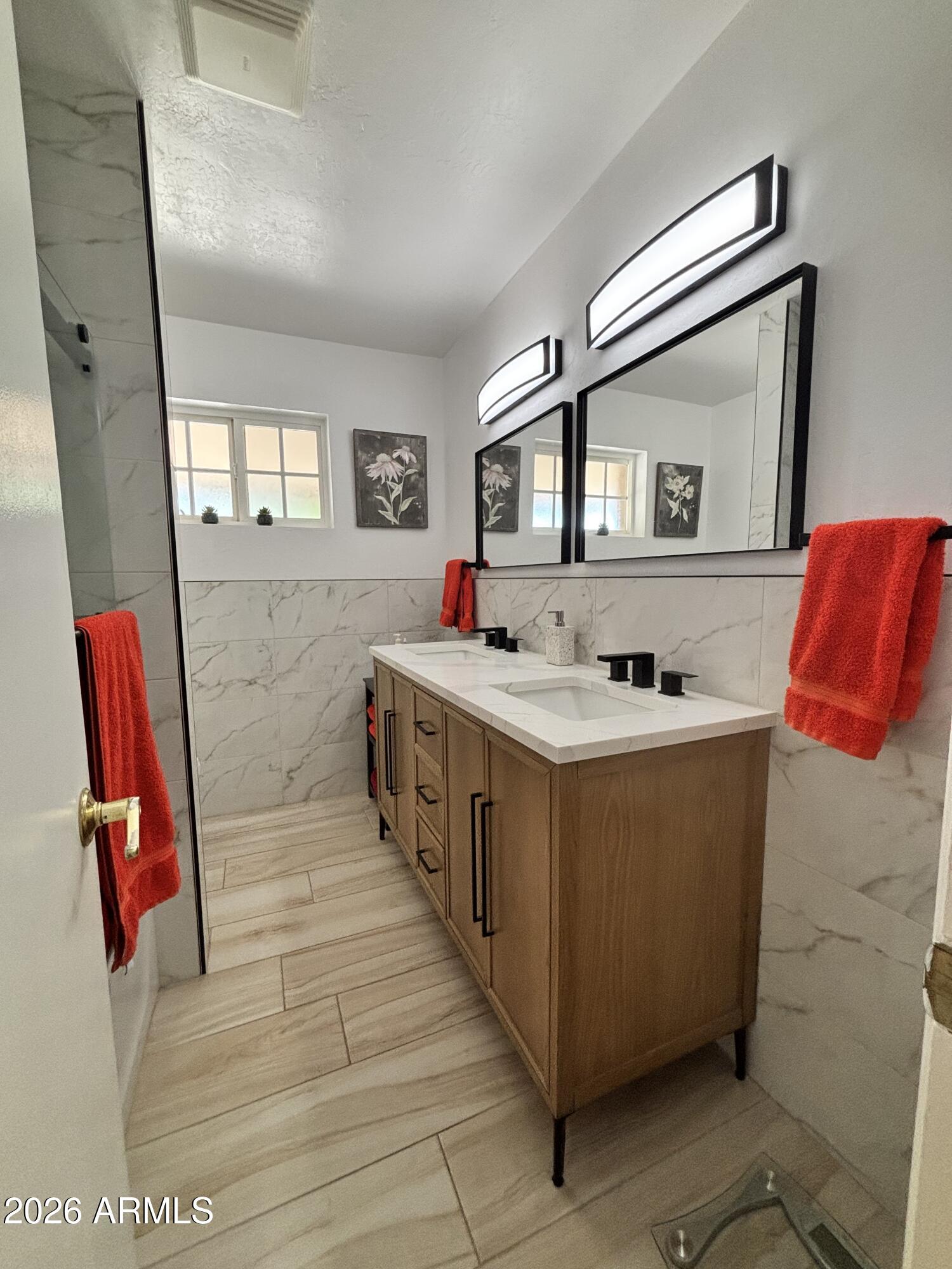 7745 East Mangun Road Mesa, AZ 85207 - Photo 26 of 35 a bathroom with a double vanity sink mirror and tub