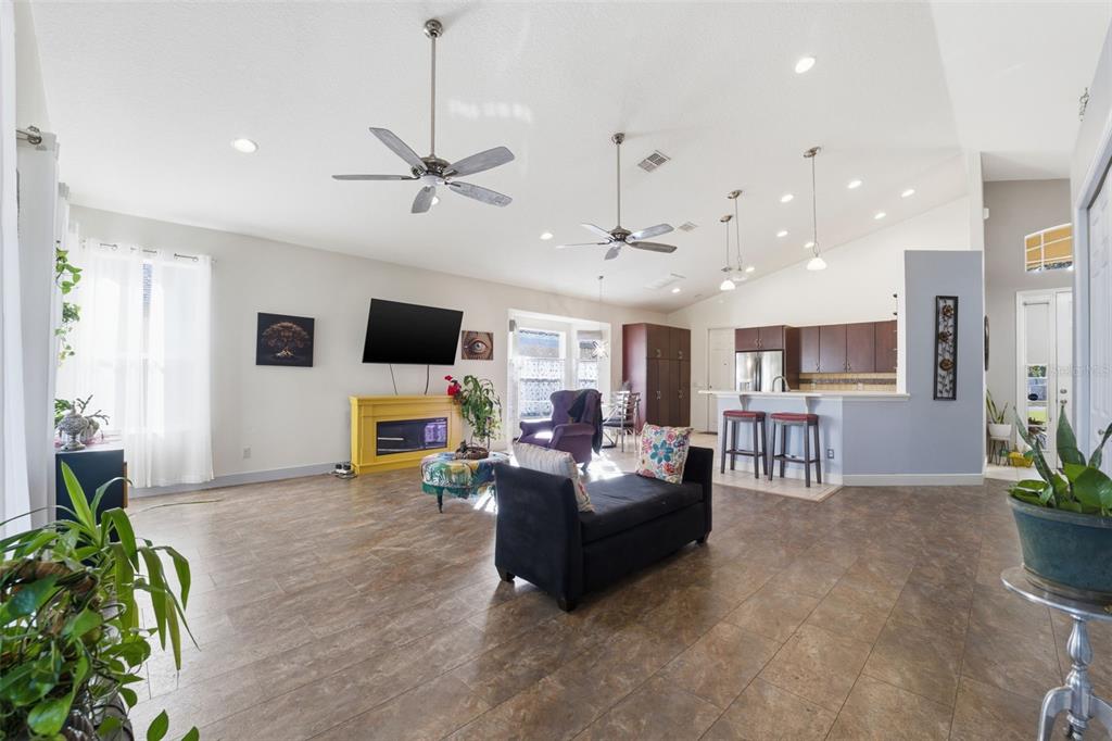 1733 West Caroline Path Lecanto, FL 34461 - Photo 27 of 29 a living room with furniture and a flat screen tv
