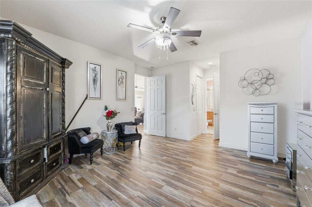 1733 West Caroline Path Lecanto, FL 34461 - Photo 28 of 29 a view of a workspace with furniture and wooden floor