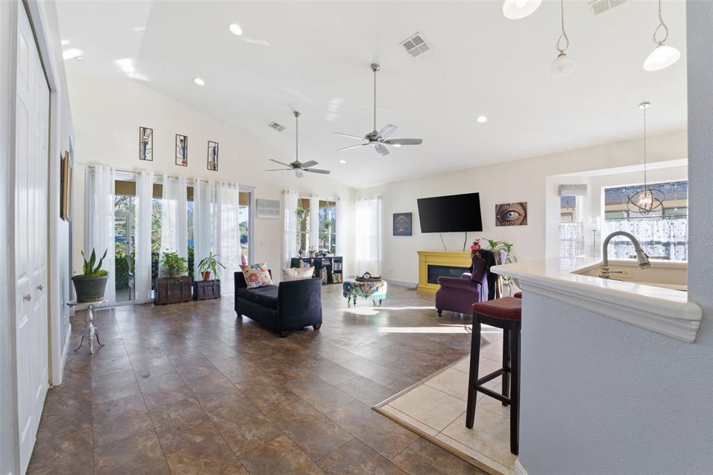 1733 West Caroline Path Lecanto, FL 34461 - Photo 5 of 29 a living room with furniture and a flat screen tv