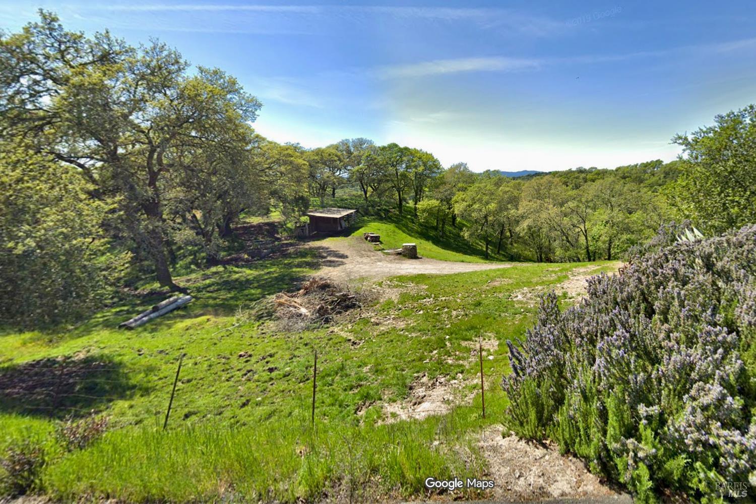 1477 Leslie Road Healdsburg, CA 95448 - Photo 27 of 40 Previous Barn at beginning of property near gated entrance (not visible) which is to the right of the lavender bushes.