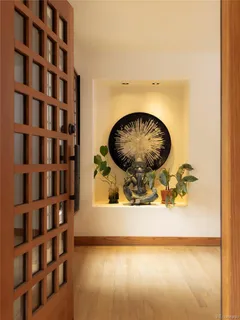a view of a living room with a wooden floor