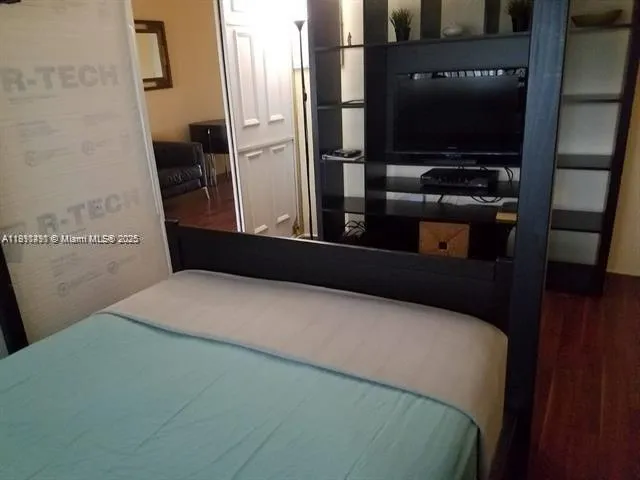 a living room with wooden floor