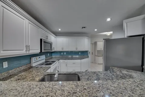 $339,900 | 12438 Crystal Pointe Drive, Unit 102, Boynton Beach, FL 33437