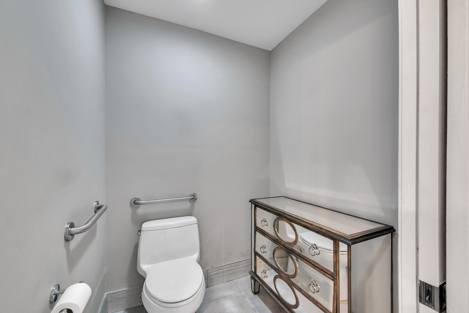 12438 Crystal Pointe Drive, Unit 102 Boynton Beach, FL 33437 - Photo 23 of 39 a white toilet sitting next to a white wall