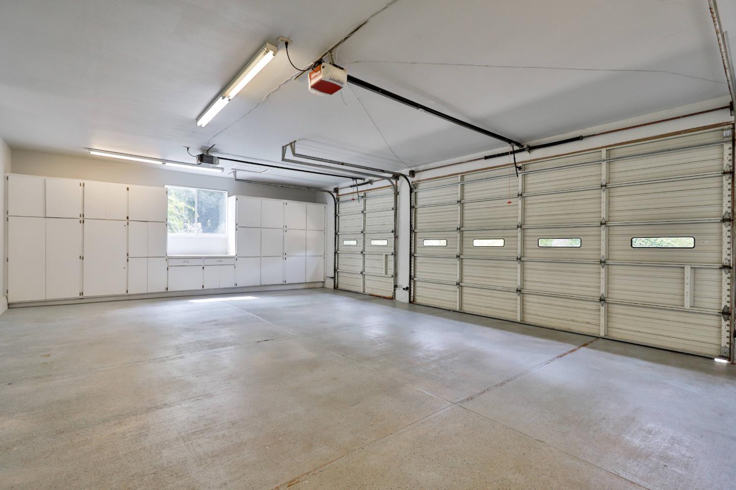 4773 Jacarah Road Placerville, CA 95667 - Photo 45 of 94 Storage on right wall in main house garage.