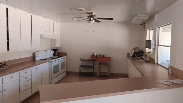 a workspace with furniture window and wooden floor