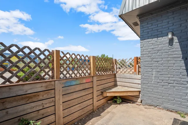 a view of a wooden fence