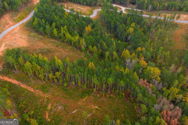 a view of a lake with a yard