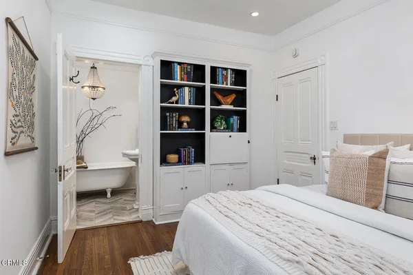 a bathroom with a bathtub and sink