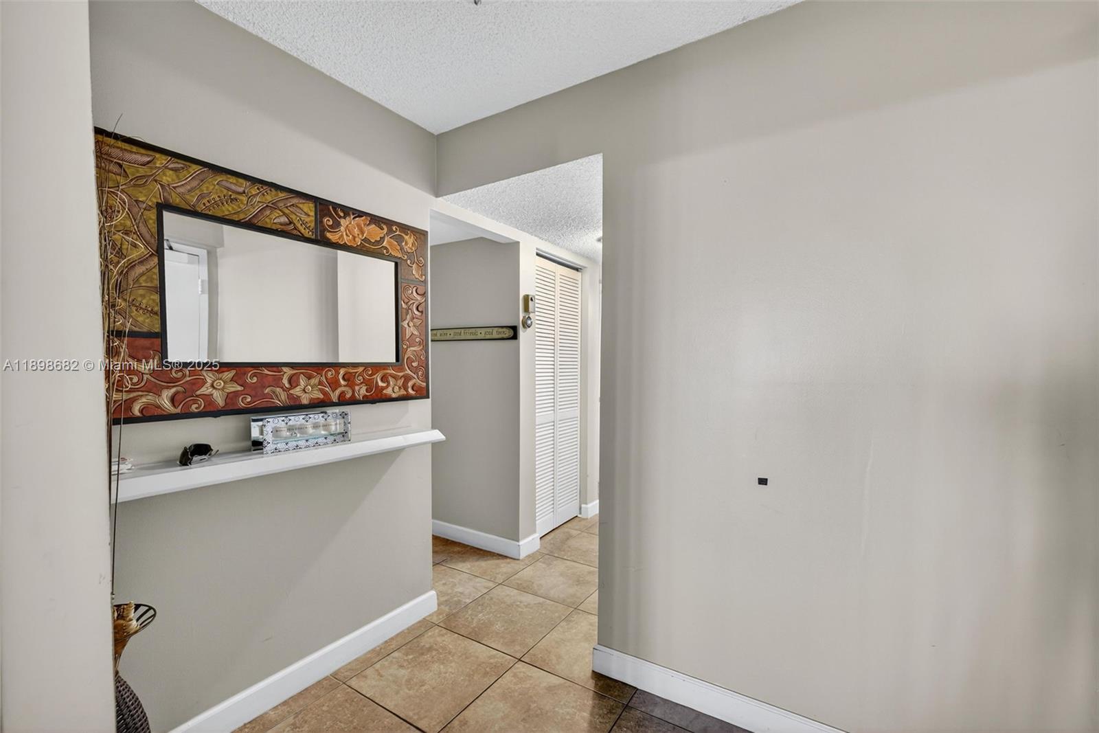 3821 Environ Boulevard, Unit 411 Lauderhill, FL 33319 - Photo 11 of 62 a bathroom with a sink and a mirror